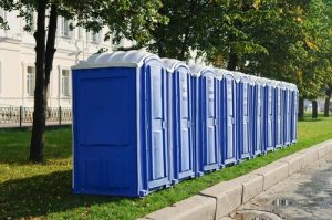 line of blue porta potties outdoor