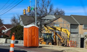 porta potty next to road construction